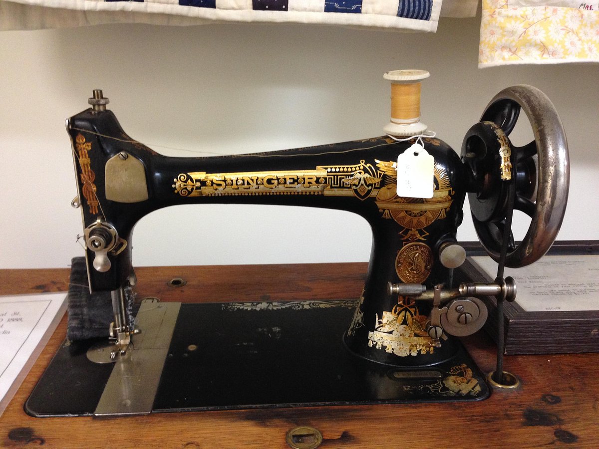 Image of an antique Swinger sewing machine